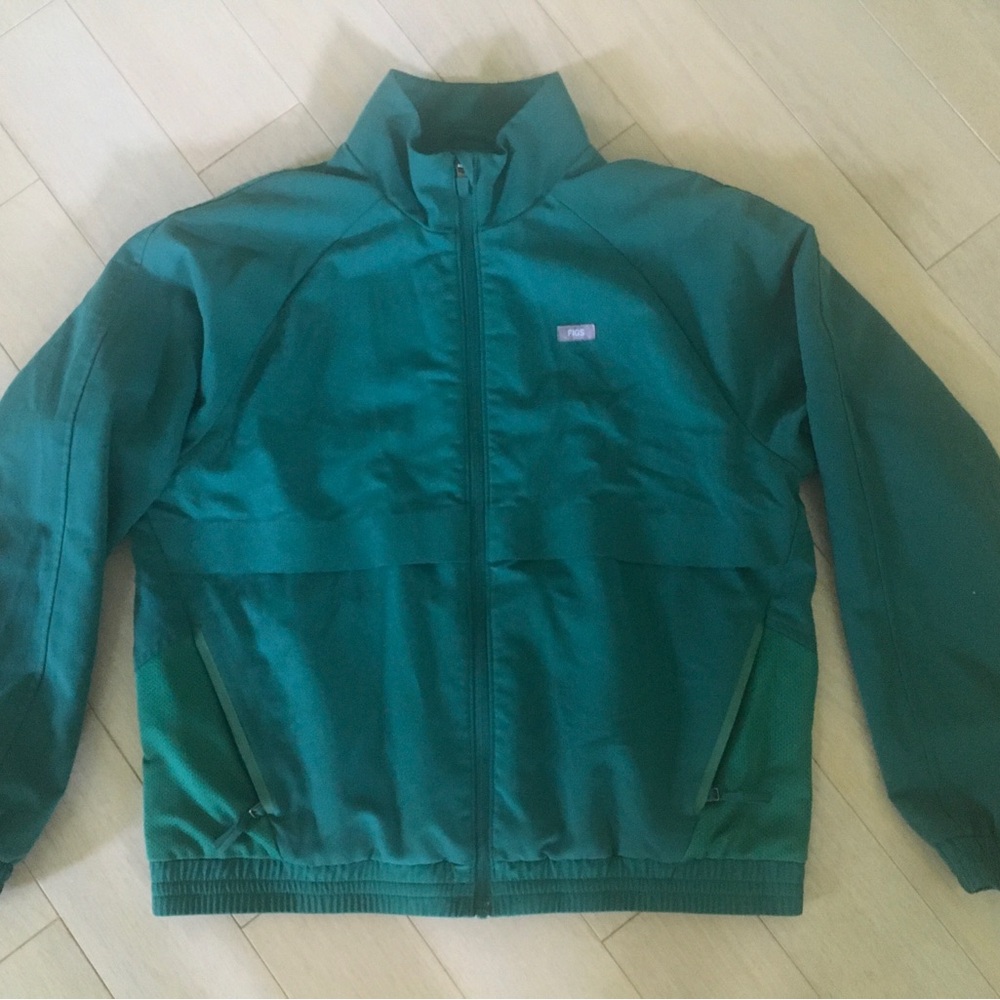 FIGS Sydney Scrub Jacket in a hunter green color - Picture 4 of 13